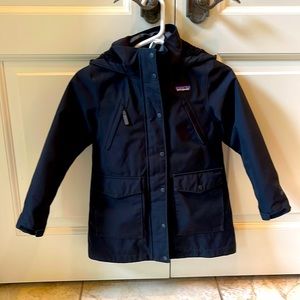 Girls Patagonia black winter jacket.